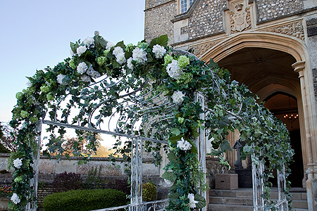 Wedding entrance trellis with artificial flowers