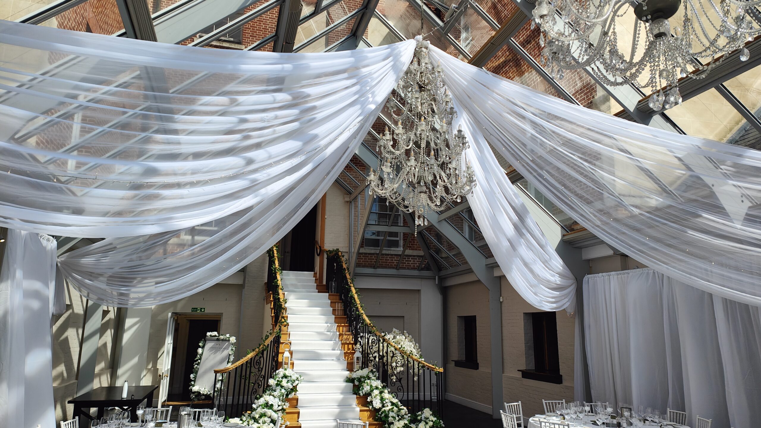 White draping in a wedding venue