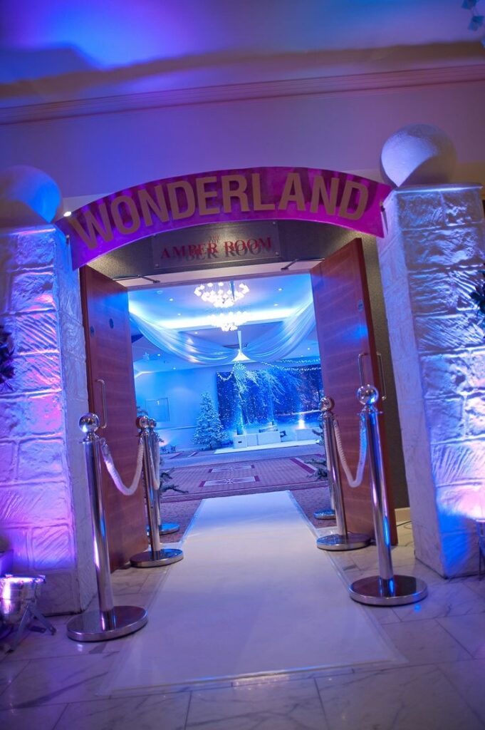 Winter wonderland entranceway corporate Christmas party theme 