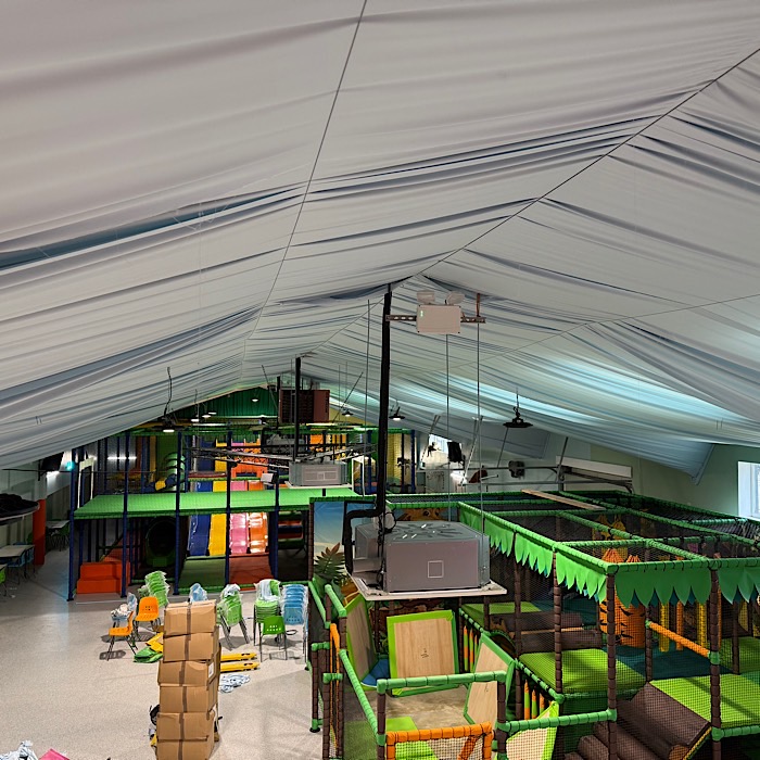 Full venue permanent ceiling drapes in sky blue {{brizy_dc_image_alt imageSrc=