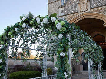 Wedding entrance trellis with artificial flowers