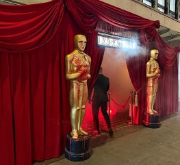 Velvet red drapes creating an entranceway for an event {{brizy_dc_image_alt imageSrc=