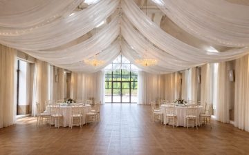 White and ivory wedding draping full room decor {{brizy_dc_image_alt imageSrc=