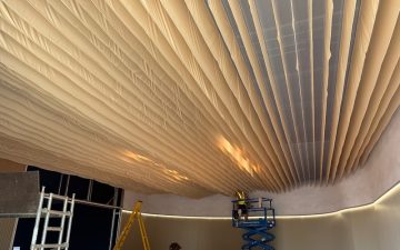 Bespoke draping ceiling, waving ceiling for JLR {{brizy_dc_image_alt imageSrc=