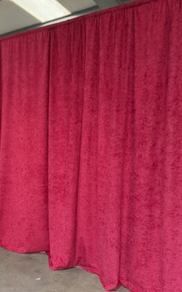 Cherry red velvet wall drapes Cherry red velvet wall drapes