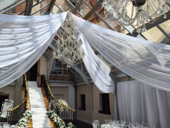 White draping in a wedding venue