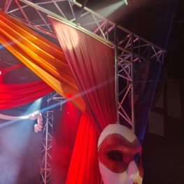 IMG_2279 Mask prop on stage with drapes, masquerade circus theme