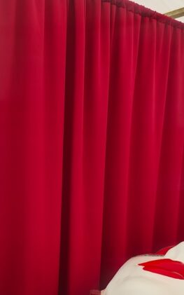 Berry Red Dim out Wall Drapes Wall Drape and wall drapes at hire. Blackout wall drapes for events
